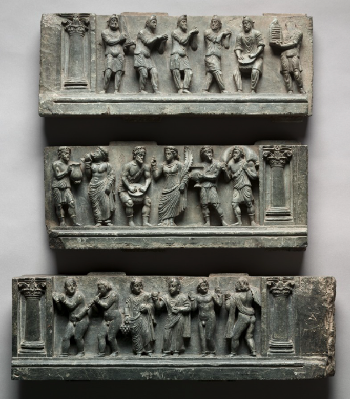 Reliefs from a Gandharan Buddhist stupa in Buner region at Cleveland Museum of Art showing various groups of people, Scythians, Greeks, and local monks, drinking, dancing, and playing music.