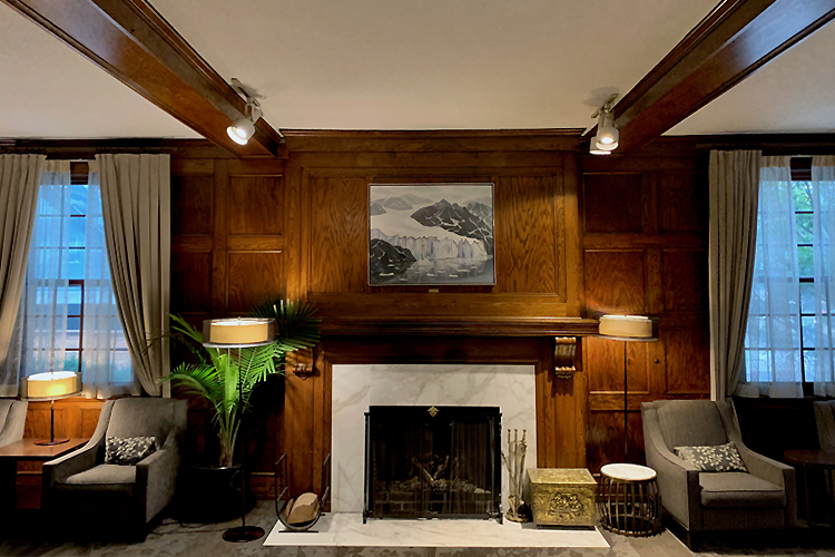 Doris McCarthy's Glacier Bay hanging above fireplace in Faculty Club lounge